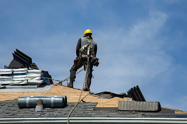 Professional Roofing technician working in Vermont, VT